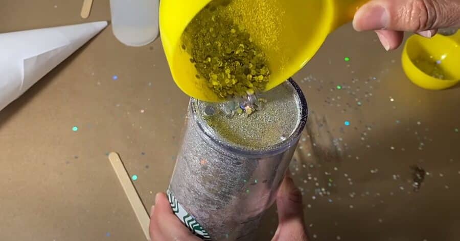 adding some chunky glitter - How To Make A Snow Globe Tumbler? Step by Step Guide